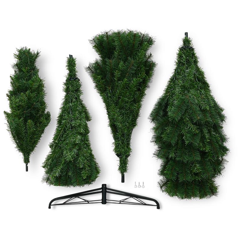 De losse delen van de Action Kerstboom XXL naast elkaar met de metalen voet eronder
